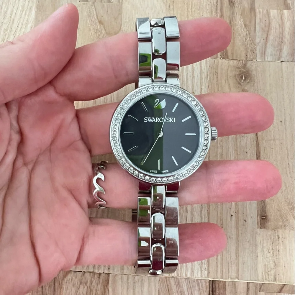 Swarovski ladies stainless steel charcoal gray dial dress watch NEW BATTERY